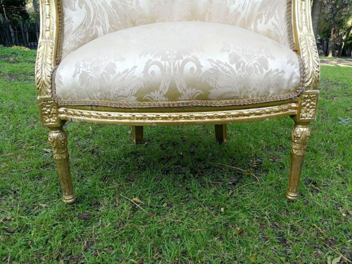 A Pair of French Louis XVI  Style Ornately Carved and Gilded Armchairs - Image 7