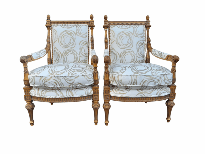 A Pair Of 20th Century Carved Wooden And Gilt-Painted Armchairs