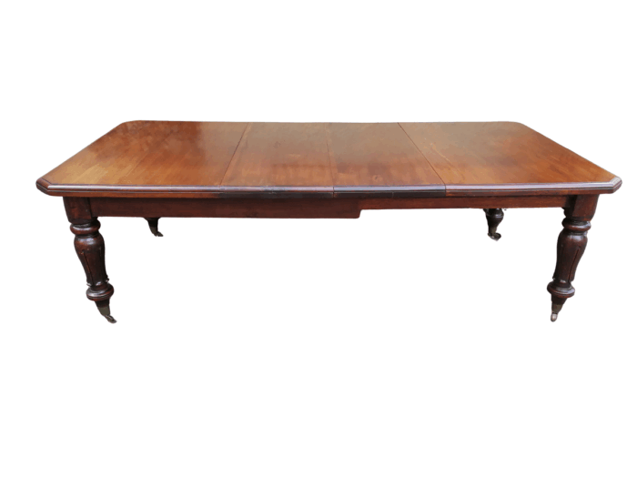 A 19th Century Late Victorian Mahogany Extending Dining Table on Brass Castors with Crank Handle