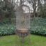 A 20th Century Hand-Gilded with Gold-Leaf  Wrought Ion Birdcage on Stand