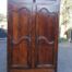 A Late 19th Century Circa 1890 French Oak Provincial Armoire With Metal Escutcheons