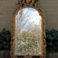 A 19th Century-Style Gilt-Painted Wooden And Bevelled Mirror