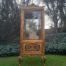 A French Louis XVI Showcase From The 1800s Gilded With Gold Leaf