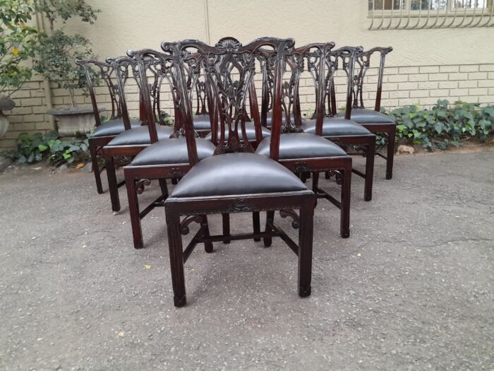 A 20th Century Set of Ten English Mahogany Chippendale Style Chairs with Leather Upholstered Seats - Image 2