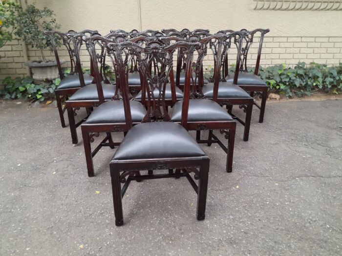 A 20th Century Set of Ten English Mahogany Chippendale Style Chairs with Leather Upholstered Seats - Image 3