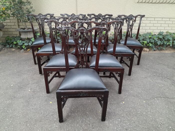 A 20th Century Set of Ten English Mahogany Chippendale Style Chairs with Leather Upholstered Seats - Image 4