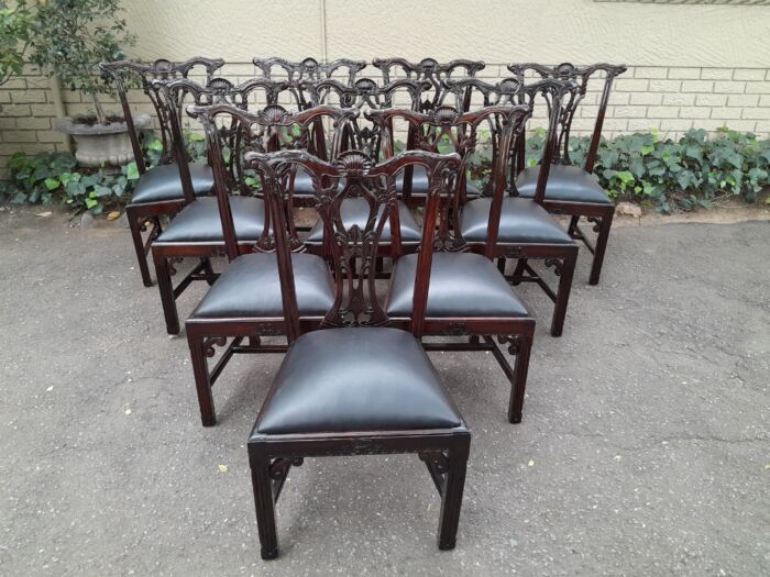 A 20th Century Set of Ten English Mahogany Chippendale Style Chairs with Leather Upholstered Seats - Image 5