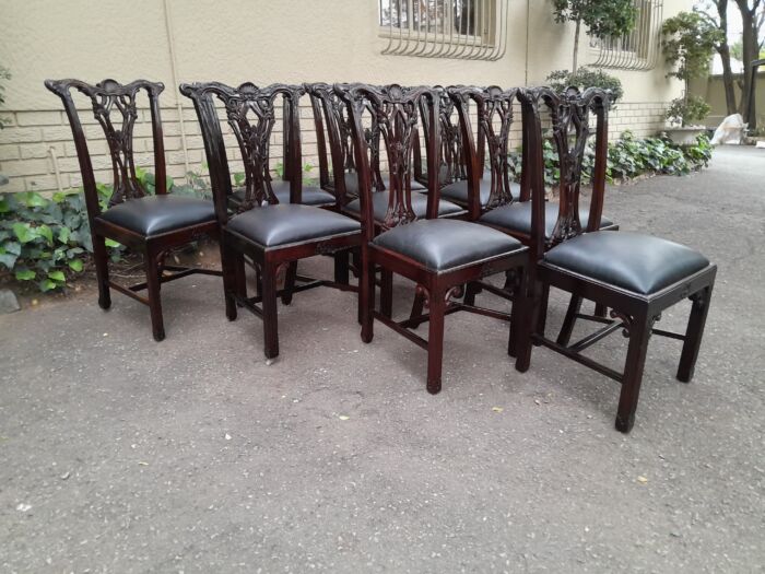 A 20th Century Set of Ten English Mahogany Chippendale Style Chairs with Leather Upholstered Seats - Image 7
