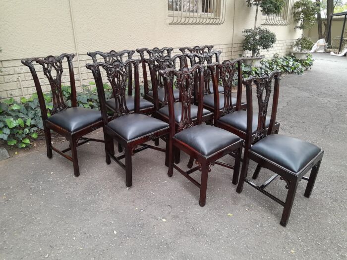 A 20th Century Set of Ten English Mahogany Chippendale Style Chairs with Leather Upholstered Seats - Image 8