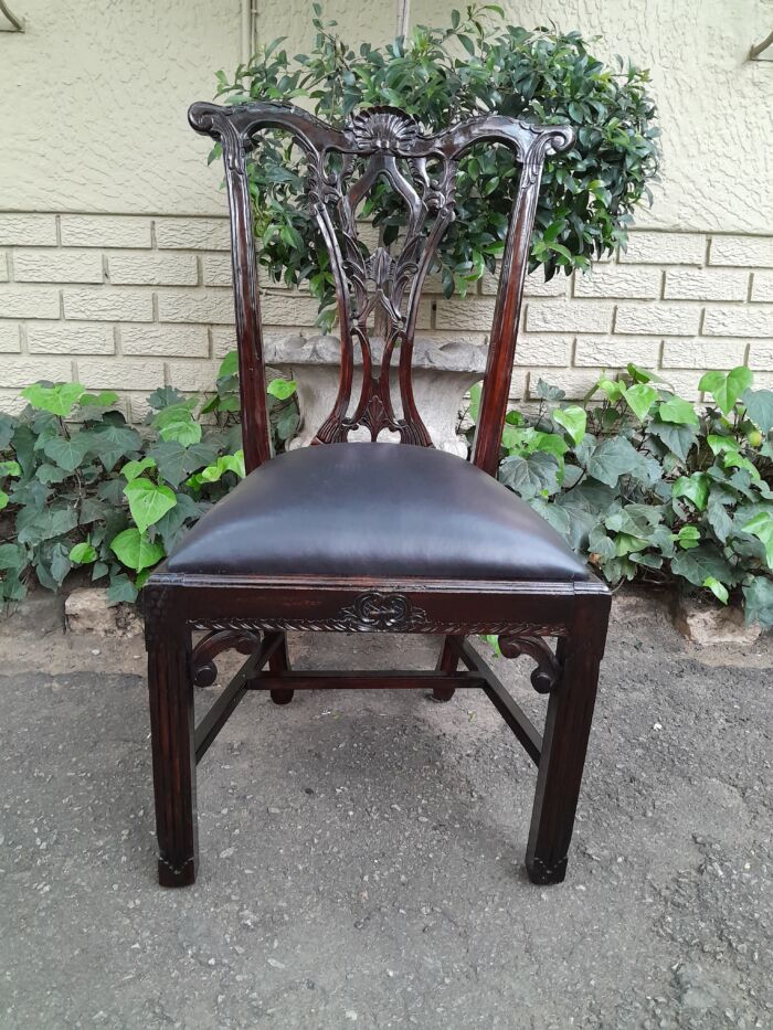 A 20th Century Set of Ten English Mahogany Chippendale Style Chairs with Leather Upholstered Seats - Image 9