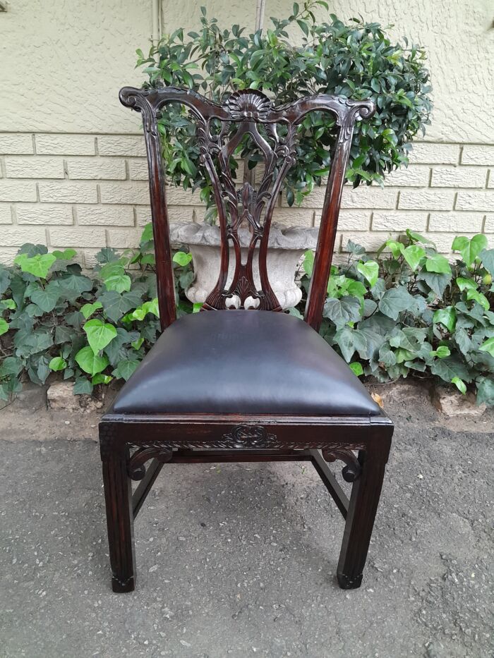A 20th Century Set of Ten English Mahogany Chippendale Style Chairs with Leather Upholstered Seats - Image 10