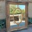 A Large and Heavily Carved Giltwood Bevelled Mirror