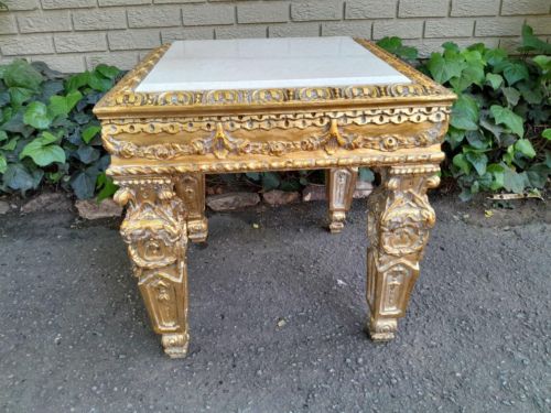 A 20th Century French Style Ornately Carved Side Table with Marble Top
