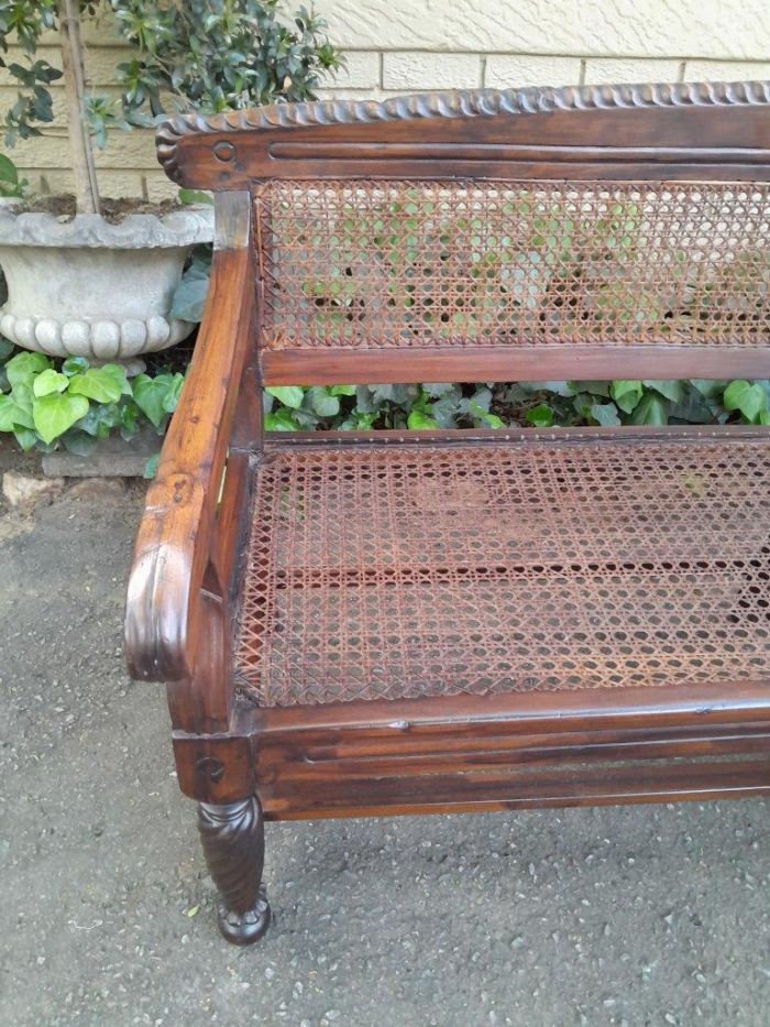 An Early 19th Century Rosewood Colonial Carved Bench with New Rattan in an Ebonised Finish - Image 6