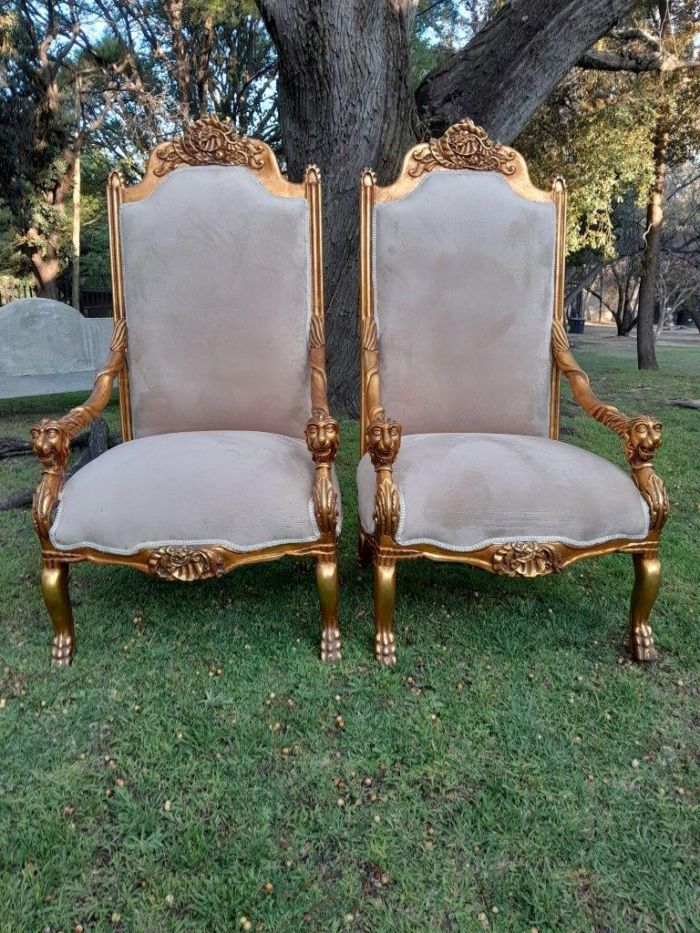 An Exceptional Pair of 20th Century French Style Ornately Carved & Giltwood Throne Chairs