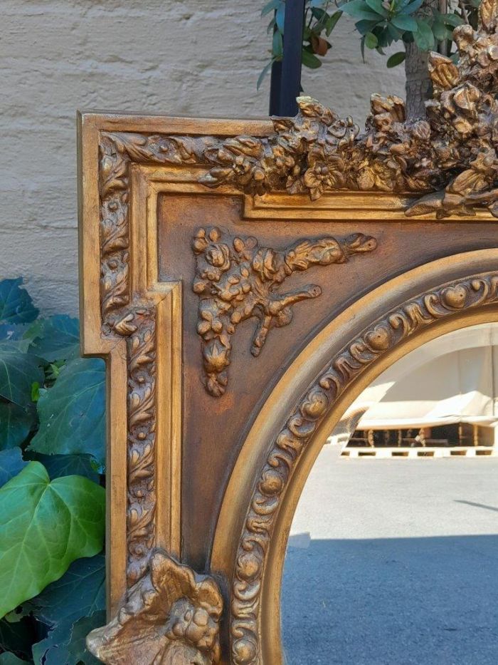 A 20th Century French Style Ornately Carved and Gilded Bevelled Mirror - Image 4