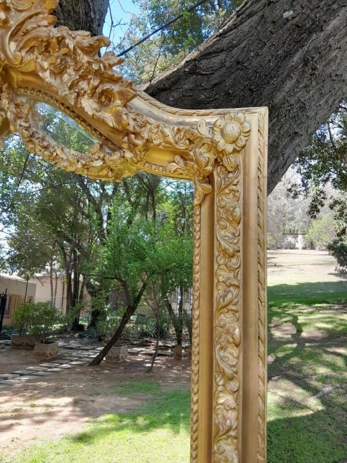 A French Rococo Style Ornately Carved and Gilded Bevelled Mirror - Image 4