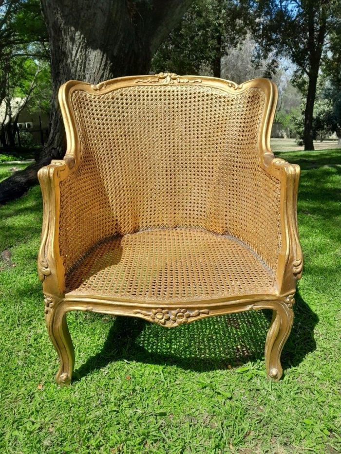 A 20th Century Pair of French Style Rattan Hand Gilded Wing Back Chairs - Image 5