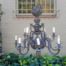 A 20th Century French Ornate Style Brass Chandelier