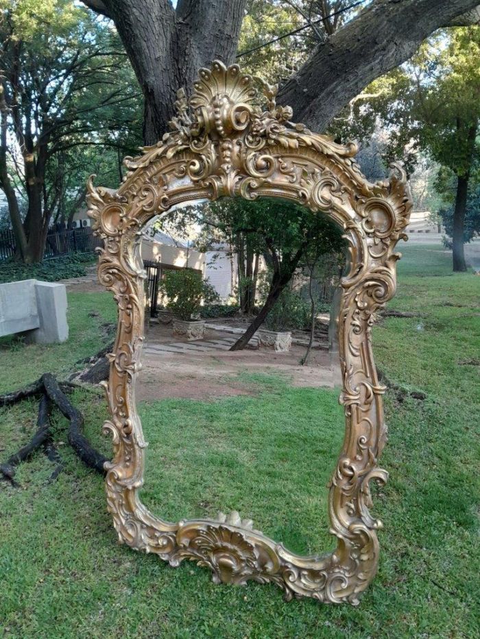 A French Rococo Style Ornately Carved and Gilded Bevelled Mirror - Image 4