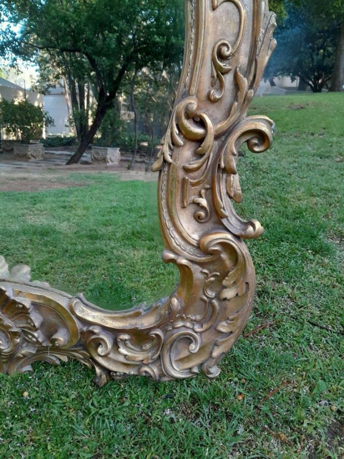 A French Rococo Style Ornately Carved and Gilded Bevelled Mirror - Image 5