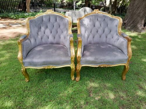 A 20th Century French Style Pair Of Carved Gilt Wood Armchairs