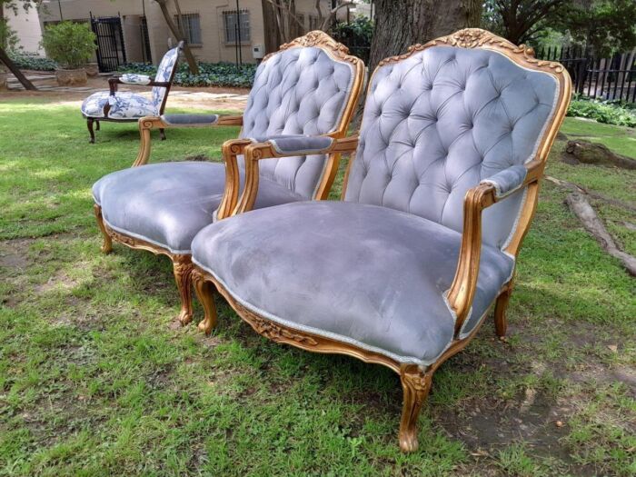 A French Style Pair Of Ornately Carved Gilt Wood Armchairs - Image 4