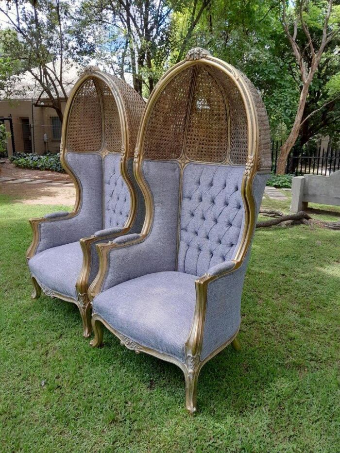 A Pair of French Style Hand Carved Wooden and Gilded Rattan Dome/Canopy Chairs Upholstered in Leather and  Modelled on the famous Louis XV Chair