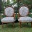 A Late 19th/Early 20th Century French Pair Of Gilded Carved Bergere Chairs