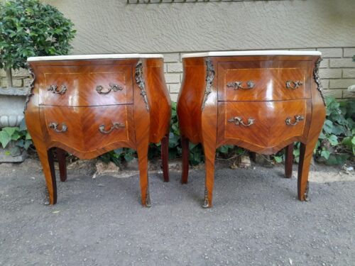A 20th Century Pair Of French Style Mahogany Bombe Pedestals With Marble Tops & Ormolu Mounts