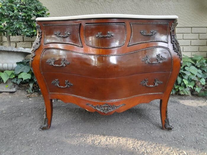 A 20th Century French Style Mahogany Bombe Chest Of Drawers With Marble Top & Ormolu Mounts