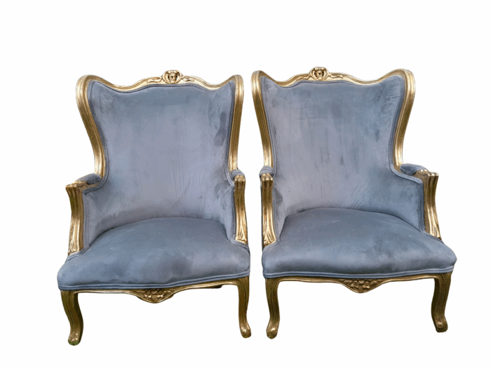 A Pair Of French Style Carved Wooden Wingback Armchairs