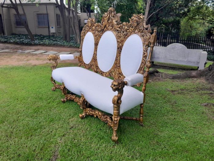 A 19th Century Ornately Carved Walnut Wood Settee Hand Gilded With Gold Leaf And Upholstered In A Linen Fabric - Image 3