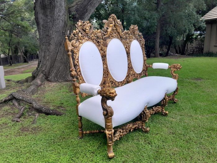 A 19th Century Ornately Carved Walnut Wood Settee Hand Gilded With Gold Leaf And Upholstered In A Linen Fabric - Image 4