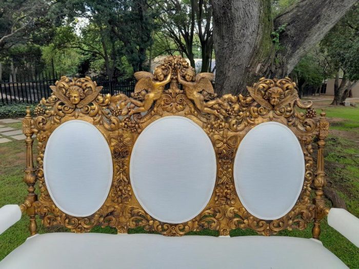 A 19th Century Ornately Carved Walnut Wood Settee Hand Gilded With Gold Leaf And Upholstered In A Linen Fabric - Image 7