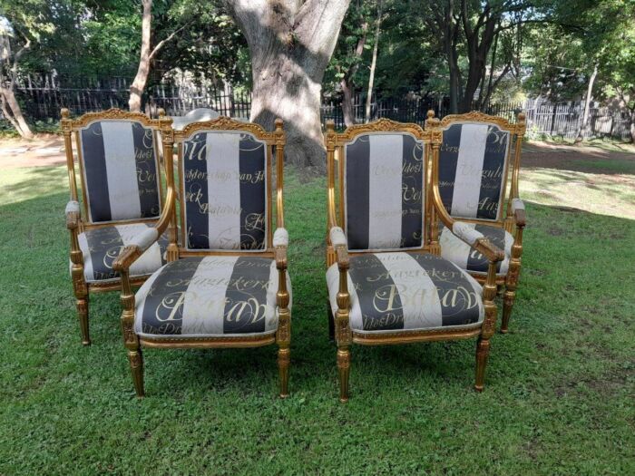 A French Style Set Of Four Ornately Carved And Gilded Armchairs In A Custom-Made Stripe And Script Linen (Also Sold As Pairs SKU 3109) - Image 2