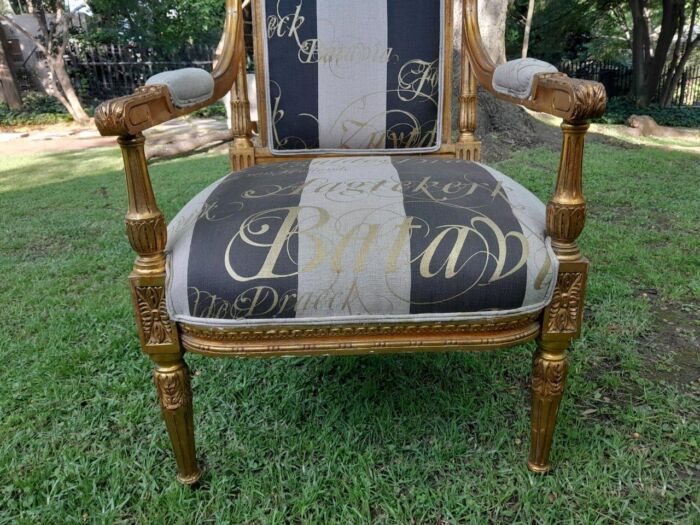 A French Style Set Of Four Ornately Carved And Gilded Armchairs In A Custom-Made Stripe And Script Linen (Also Sold As Pairs SKU 3109) - Image 10