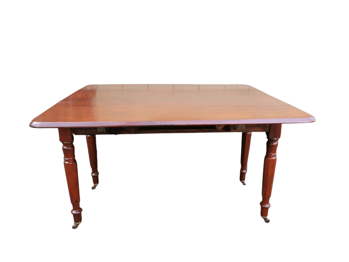 An Early 20th Century Mahogany Pembroke Table On Turned Legs