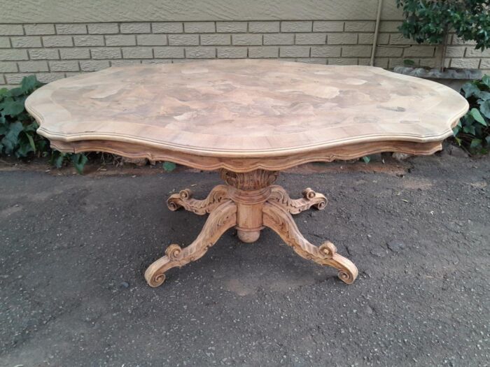 A 29th Century Victorian Style Carved Rosewood Carved Centre / Dining / Breakfast Bleached / Natural Finish Table
