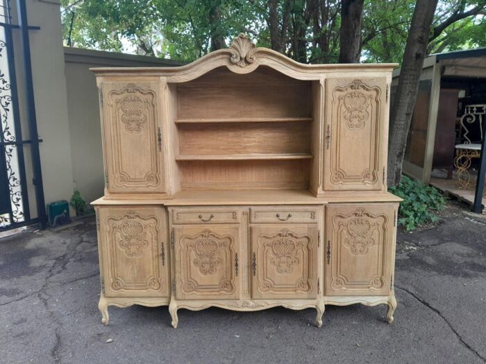 A 20th Century French Style Carved Wooden Sideboard / Server / Drinks Cabinet In A Contemporary Natural Wood / Bleached Finish - Image 2