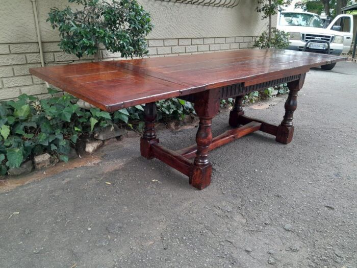 An Antique 19th Century Oak Refectory Table On Stretcher Base With Two Drawer Leaves (8-10 Seater) - Image 4