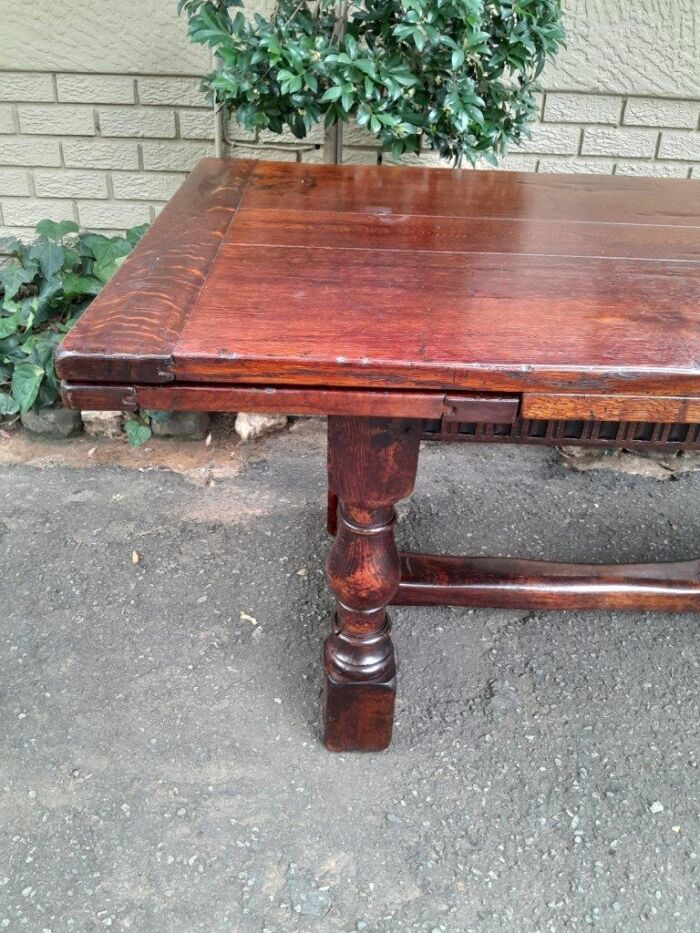 An Antique 19th Century Oak Refectory Table On Stretcher Base With Two Drawer Leaves (8-10 Seater) - Image 8