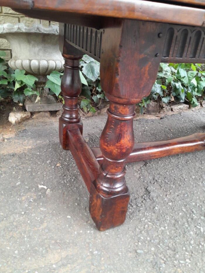 An Antique 19th Century Oak Refectory Table On Stretcher Base With Two Drawer Leaves (8-10 Seater) - Image 9