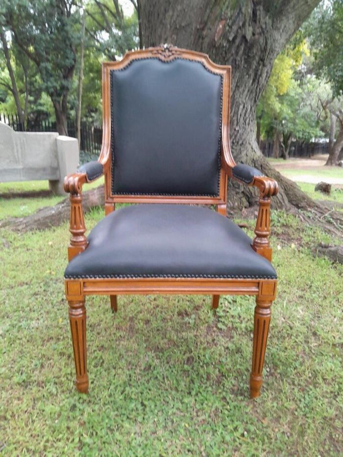 A 20th Century French Style Carved Mahogany Armchair