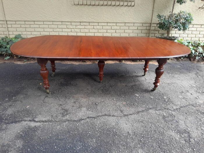 A 20th Century French Colonial Table on Original Brass Castors