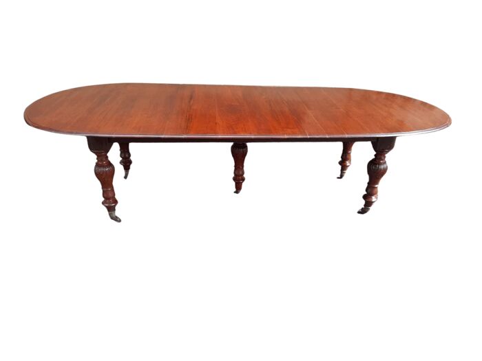 A 20th Century French Colonial Table on Original Brass Castors (10 Seater)
