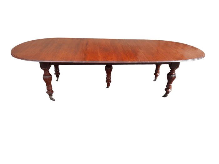 A 20th Century French Colonial Table on Original Brass Castors