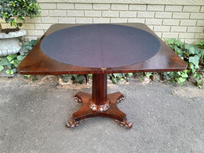 A Victorian rosewood swivel and tilt Card Table, on spreading hexagonal column to the concave platform base on knurl feet with castors - Image 4