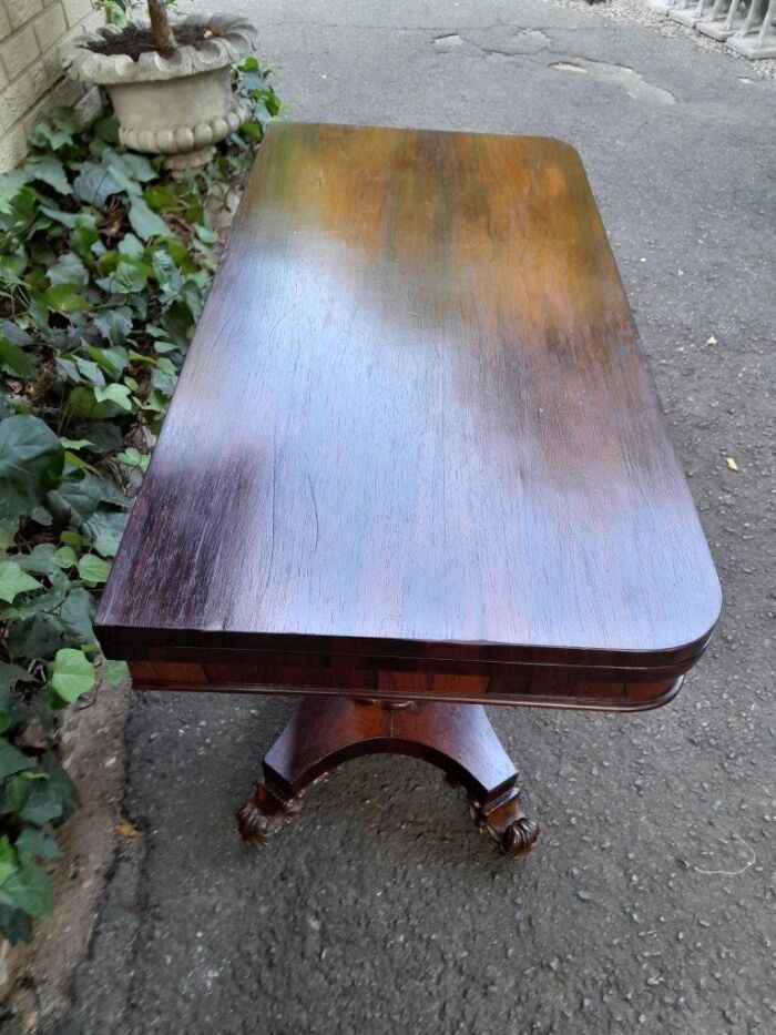 A Victorian rosewood swivel and tilt Card Table, on spreading hexagonal column to the concave platform base on knurl feet with castors - Image 5
