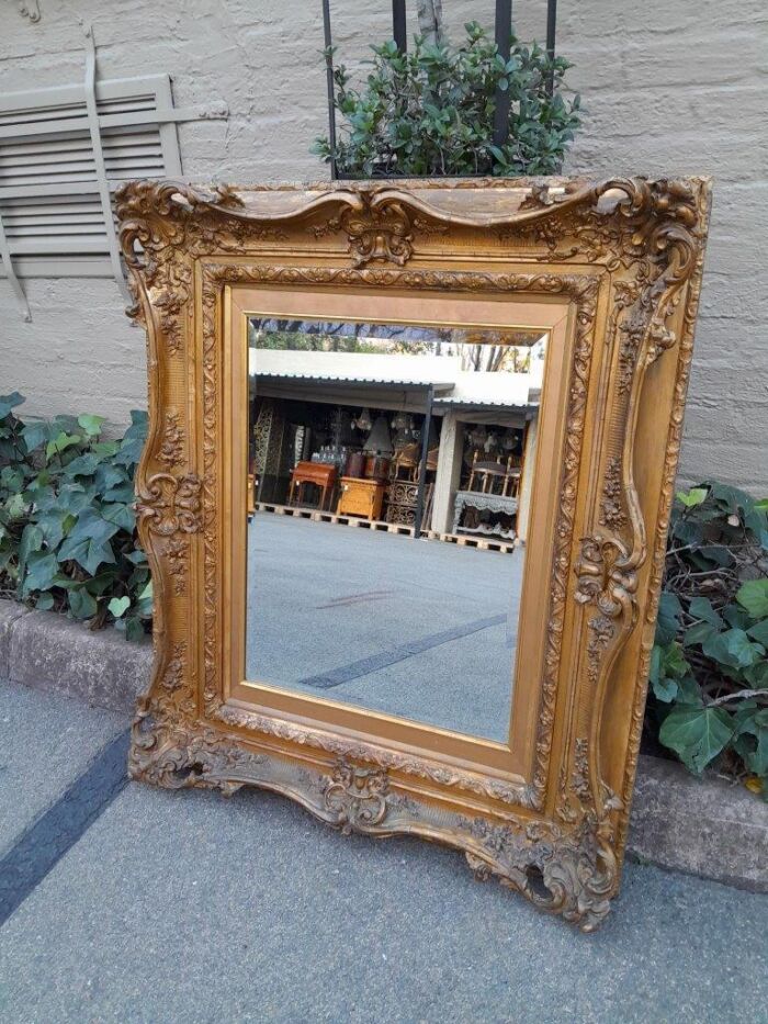 An Ornately Carved Gilt Framed Bevelled Mirror - Image 4